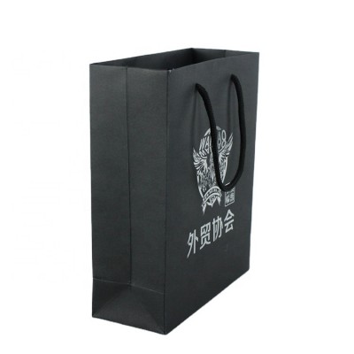 Promotional embossing silver hot stamping logo printing black kraft paper bag with handles